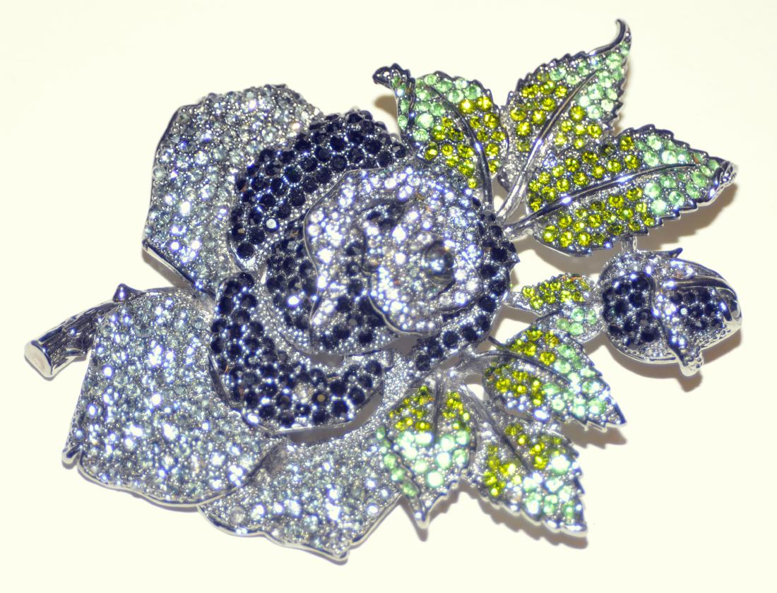 Costume stone pin massive vintage: Large pin- hair piece with multi colored rhinestones hundreds of hand set stones -about 5 x 5 1/2 inches - a stunning showpiece.