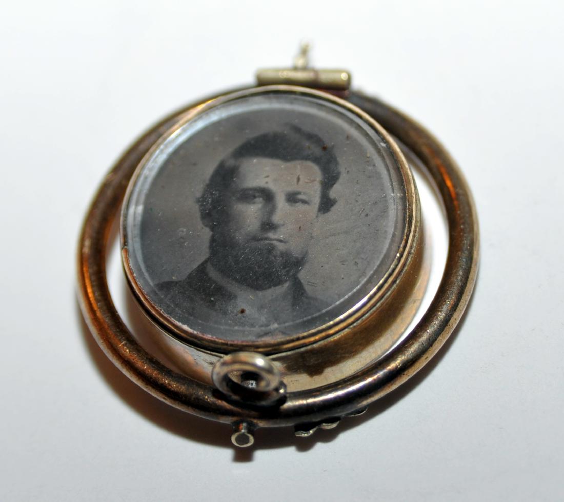 Civil War swivel pin hair locket: Hair jewelry - Civil War era pin - hair jewelry on one side and gents photo on reverse under glass - needs jewelers touch to return to pin or pendant -about 1 1/2 inches