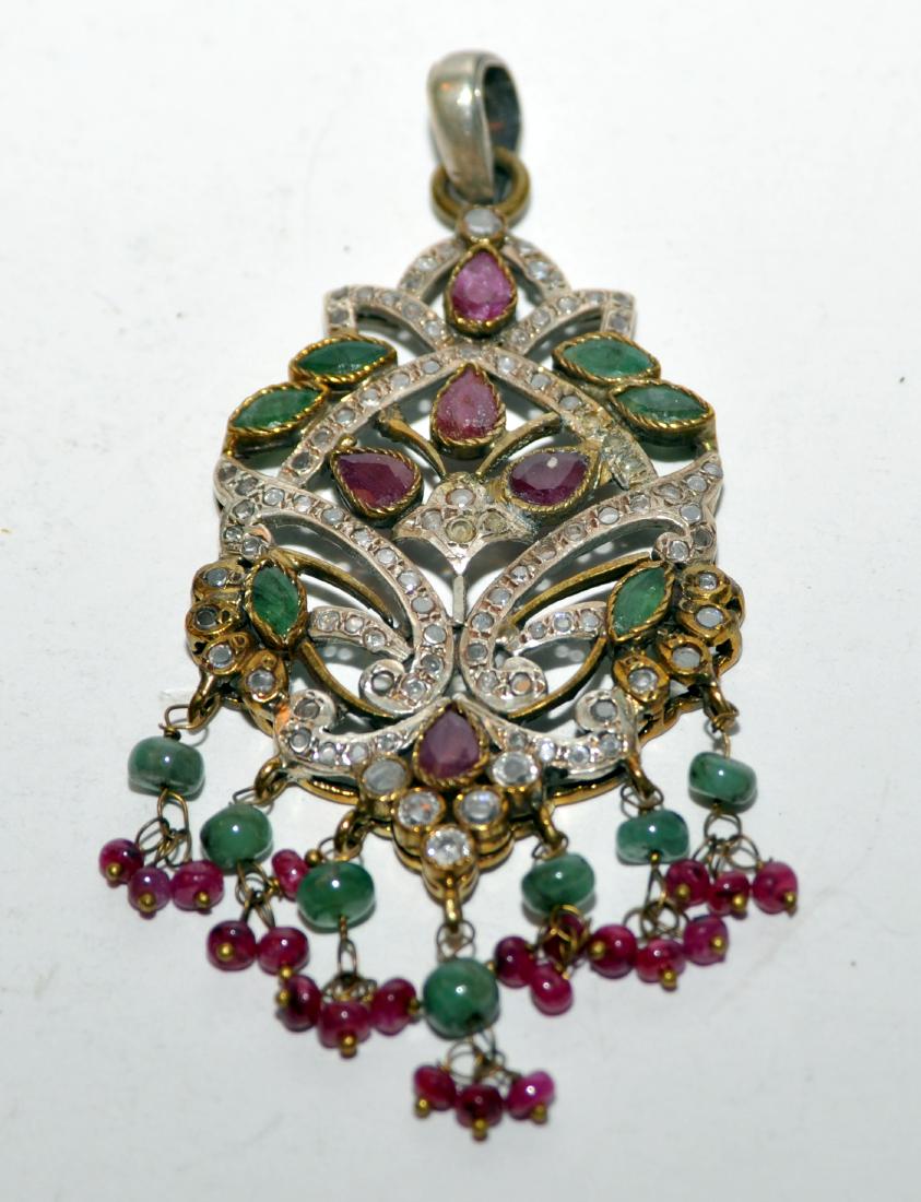 Sterling ruby emerald pendant mogul style: Pendant mogul style set with natural emeralds, rubies in beautiful hand fabricated silver piercework setting - all bezel set and all stones present in setting. - 11 large stones . Exquisite unusual pi