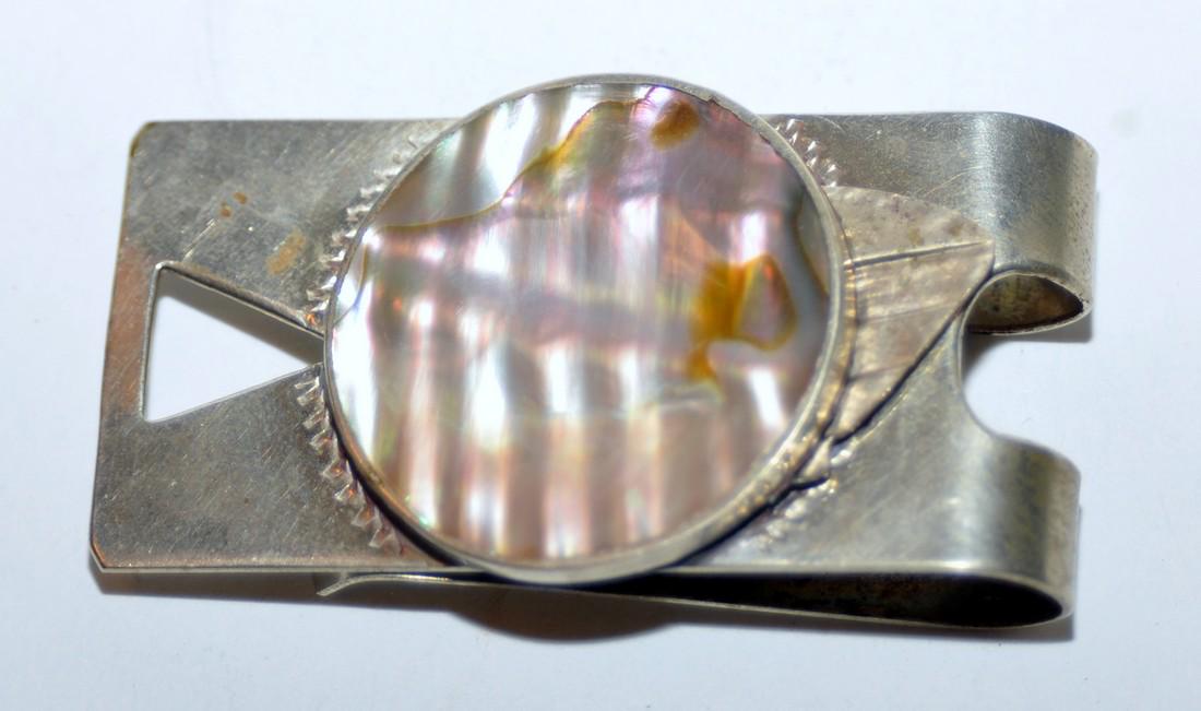 Mexican money clip - shell center: Mexican vintage money clip with shell disc in center - about 30 mm - marked in back 105 Mexico -about 2 1/4 inches