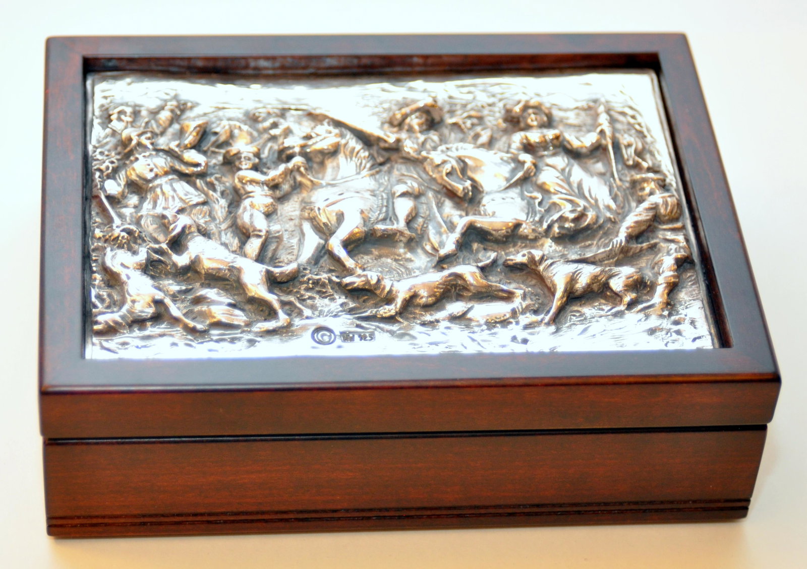 Winograd sterling signed repousse box: Signed Henryk Winograd rosewood and repousse silver box - fully lined inside - signed on top HW 925 - silver work shows men and women on horseback with trumpeter and hunting dogs- Winograd was born in
