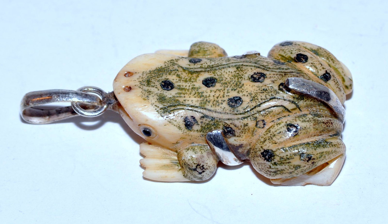 Frog bone carved pendant: Bone(cow) carved frog pendant polychromed scrimshaw custom sterling set piece-about 1 3/4 inches