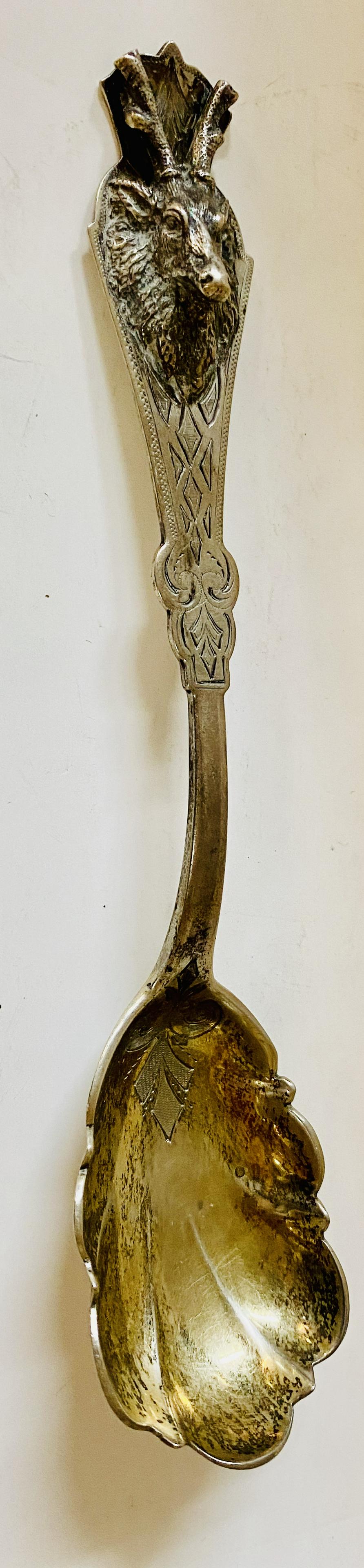 Coin silver spoon with elk on head (1 of 4)