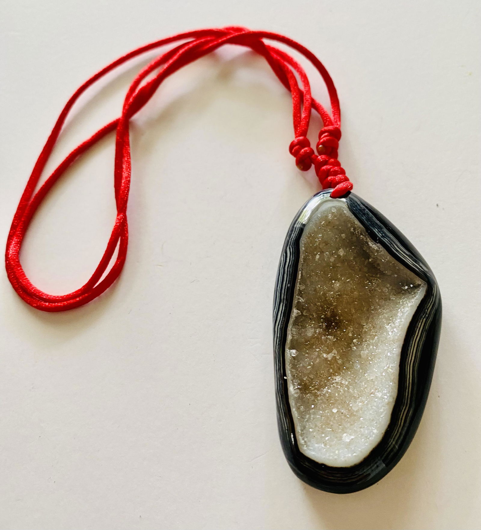 Agate druzy pendant on rope (1 of 3)