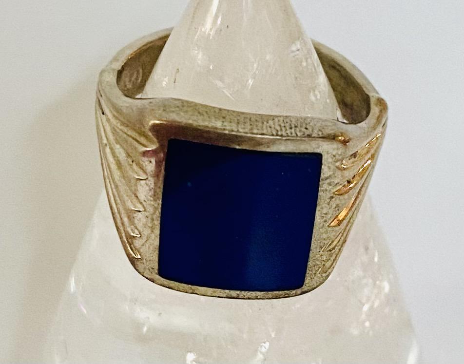 Sterling ring/blue stone: Sterling ring with large square dark blue stone- possibly lapis but may be sodalite as well. Good condition.