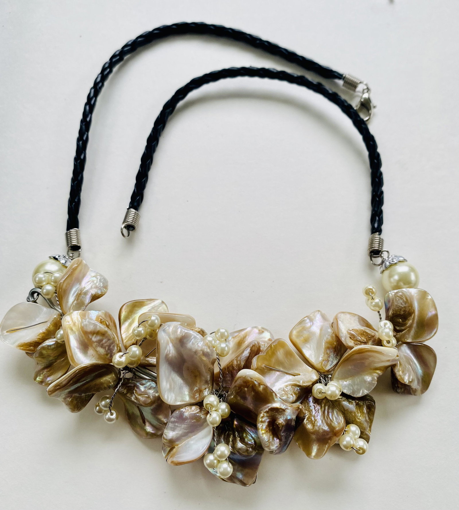 Seashell custom necklace mother of pearl: Mother of pearl seashell all cut polished and designed into necklace - very detailed and lots of workmanship went into creating this custom neck piece. About 20 inches and very good condition.
