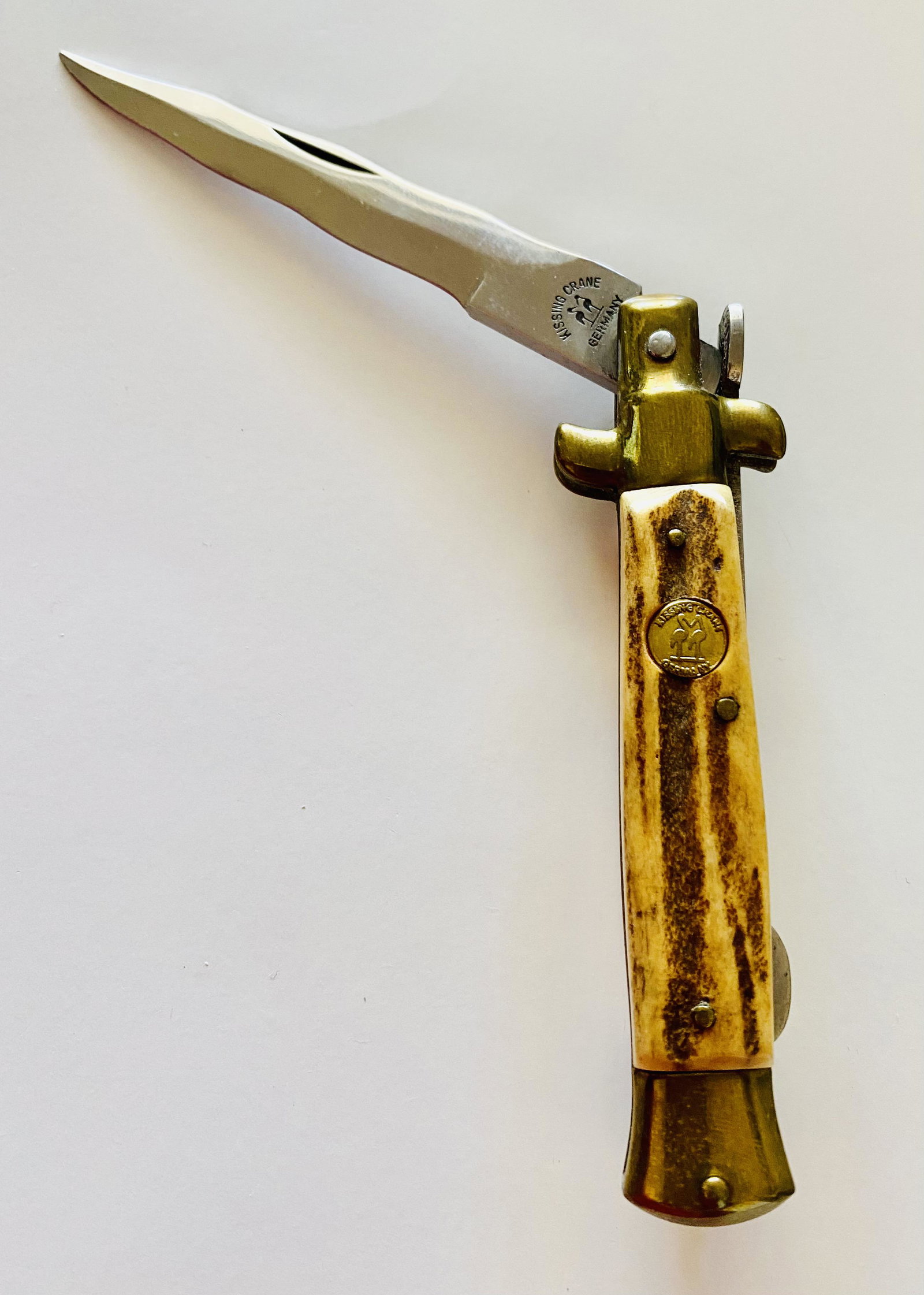 Kissing Cranes vintage German pocketknife stag handle: Kissing Cranes old German pocket knife with wavy blade and stag handle- clean well made knife in stainless steel.. About 4-5 inches long closed.