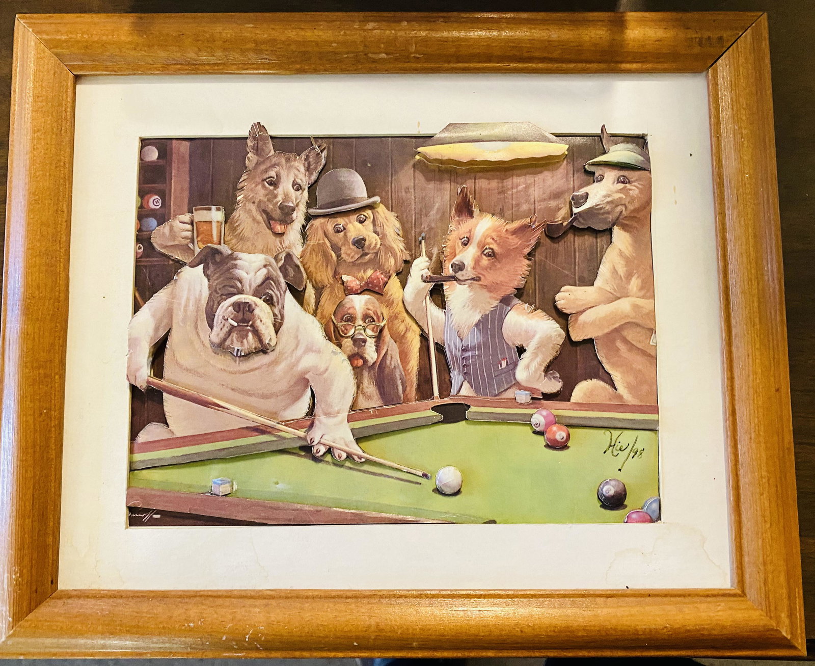 3 dimensional signed dog framed picture: Signed custom cut out 3 dimensional dogs playing pool framed picture showing a variety of dogs having a pool game. About 7 x 10 inches.