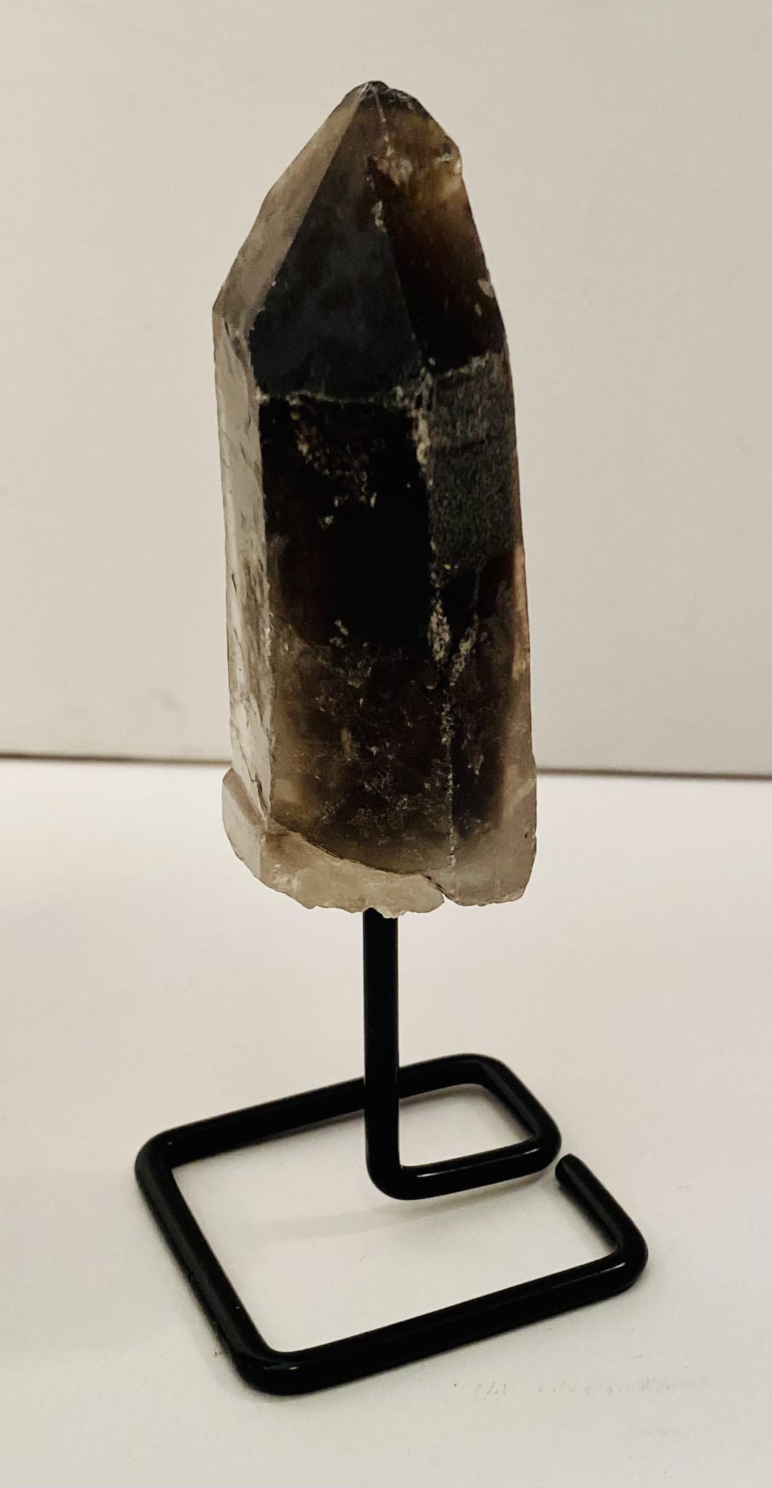 Smoky quartz crystal on stand (1 of 3)