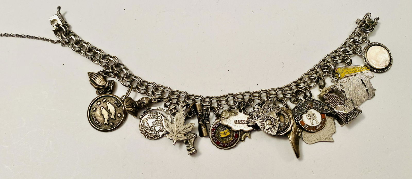 Vintage sterling charm bracelet loaded with charms (1 of 5)