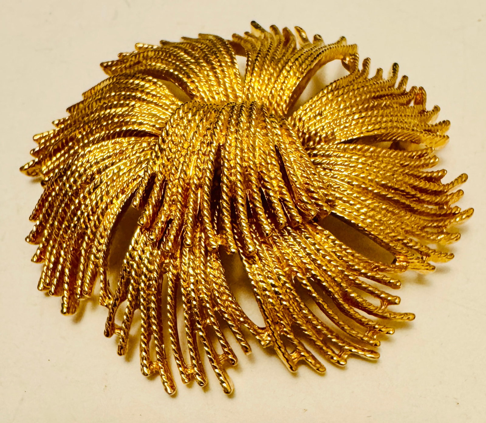 Monet large pin marked on reverse: Large gold tone Monet pin about 2 1/2 inches and in nice condition