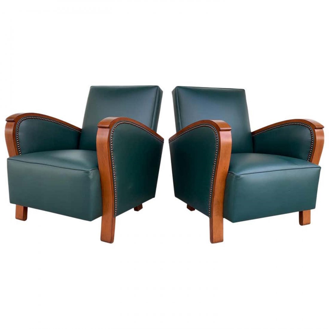 Pair of Art Deco Armchairs Upholstered in Green Leather: Beautiful set of Art Deco style chairs with slanted backs, upholstered in green leather and nailhead trimming.The chairs have beautiful lines, newly upholstered, the wood is newly refinished and they 