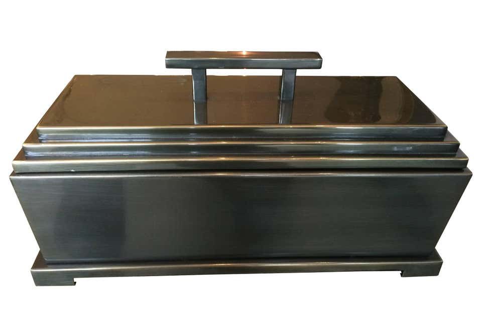 Vintage Solid Brass Jewelry Box with a Graduated Top: Fantastic and rare solid brass jewelry box in a bronze finish with a graduated top and raised base.The box is very generous in size, the inside is lined in black felt and is in very good condition wit
