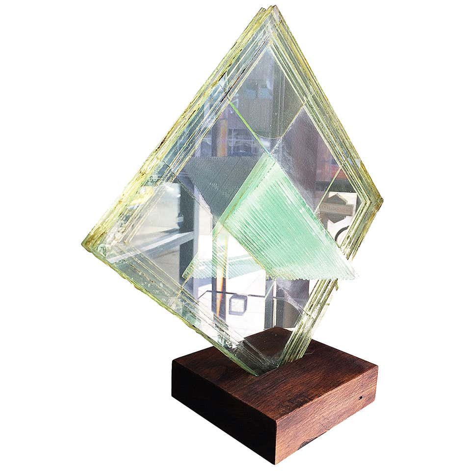 Mid-Century Modern Glass Sculpture: Beautiful and rare glass sculpture dating from the 1960s.The sculpture is well executed and is in good vintage condition.The piece is unsigned.Measurements:13.50 wide x 5.50" deep x 14" high.