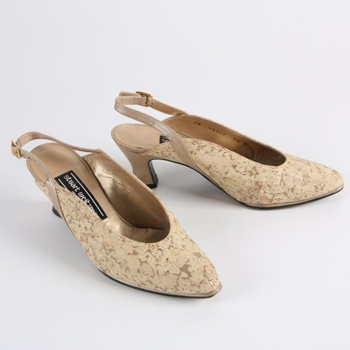 Cork Slingback Pumps by Stuart Weitzman sz 5.5: Stuart Weitzman cork slingbacks have scuffing to soles.size 5.5BThe shoes are in good used condition, the show creasing to leather and wear to the bottom of the soles.The heel is 2" high.Made in Spain