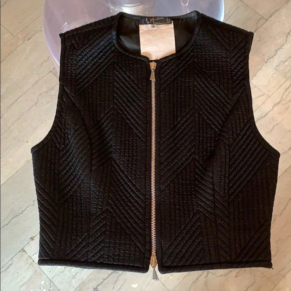 Vintage Black Vest in size 4 by Claude Montana Paris: Beautiful women’s vest designed and manufactured by Claude Montana Paris, excellent condition, no rips, holes or stains.13.5” shoulder to shoulder x 17.5” in length x 15.5” pit to pit.Made in