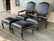 Pair of black leather armchairs and ottomans, ca 1960 - 2
