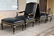 Pair of black leather armchairs and ottomans, ca 1960 - 3