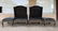 Pair of black leather armchairs and ottomans, ca 1960 - 7