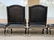 Pair of black leather armchairs and ottomans, ca 1960 - 8