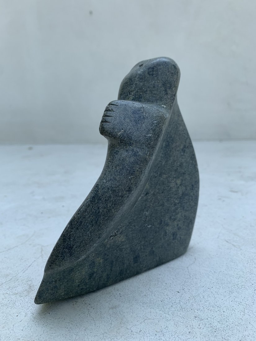 Soapstone Native Sculpture: Beautiful soapstone sculpture, probably Native American, unmarked. Measurements: 5.50 inches high x 4.75 inches deep x 2.25 inches wide. All items are sold as is. The auction house does not warrant au