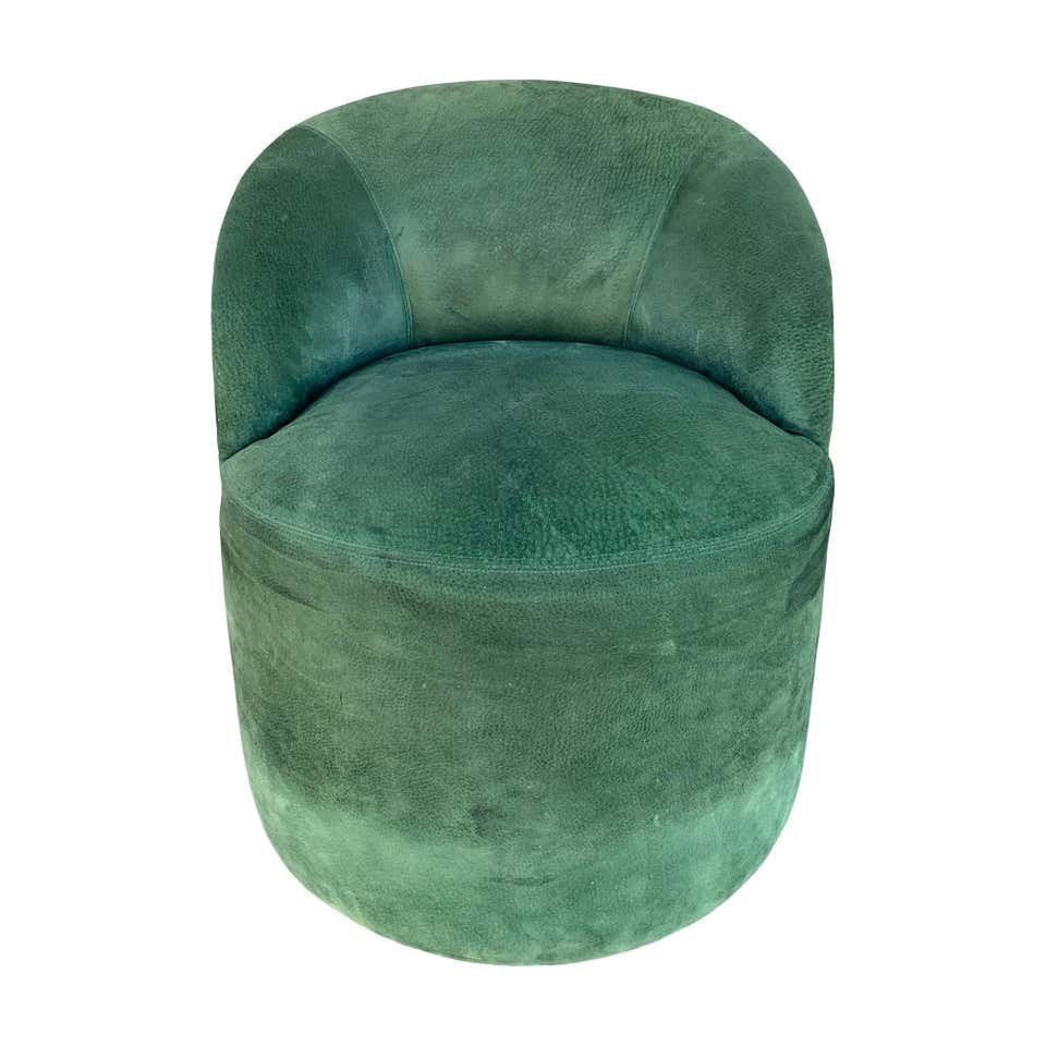 Suede Barrel Chair in the style of Karl Springer: The chair is in good condition however it shows wear and either needs to be professionally cleaned or reupholstered, the suede has no holes or tears but it does have some soiled areas and marks.The ch