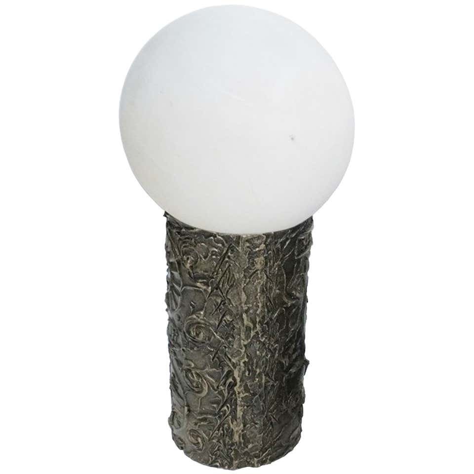 Adrian Pearsall Table Lamp in the Brutalist Style: Beautiful table lamp in the Brutalist style by Adrian Pearsall for Craft Associates.The lamp has a large frosted glass shade and the base is made of resin over wood.The lamp is in good condition and f