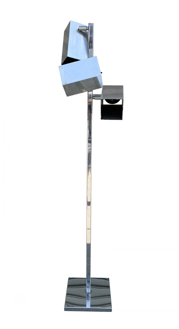 Vintage Chrome Lamp With 3 Lights from the Sony Studios: Beautiful Vintage lamp with 3 directional lights , they can be moved to direct the light.The lamp is vintage and it came out from the prop department of the Sony studios in Los Angeles.Needs to be rew