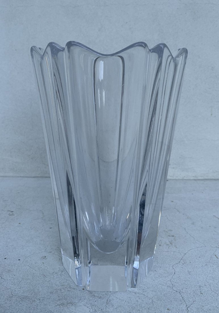 Crystal Glass Vase with Bullet Bottom Detail: Beautiful crystal vase in excellent condition, signed but cannot makeup the name of maker. Measurements: 7.75 inches high x 5 inches diameter. All items are sold as is. The auction house does not warr