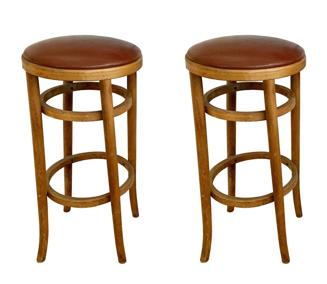 Pair of Barstools by Michael Thonet for Thonet: The photos show 3 but we have 4 stools total.A set of 4 vintage bentwood barstools designed and manufactured in the USA by Thonet.The stools retain their original finish and upholstery, they are solid