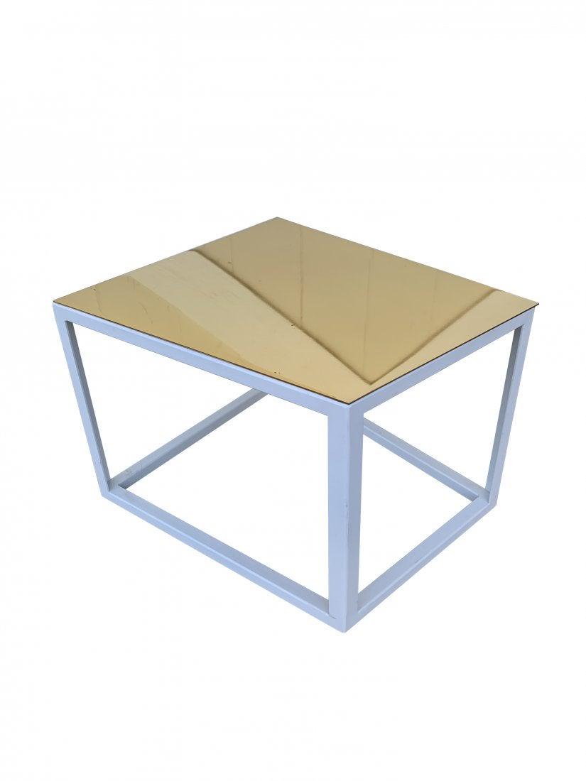 Asymetrical Side Table with Brass Top: Beautiful side table made in steel and powder coated in a white finish having a solid brass top. The table has an asymetrical shape and is quite stunning. Measurements: 19 inches wide the opposite sid
