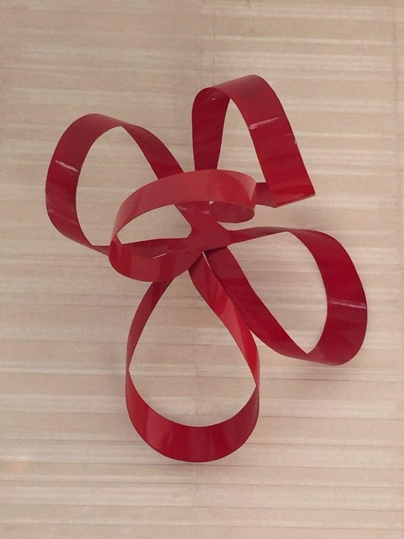 One of a Kind Red Ribbon Sculpture by Paul Chilkov: Stunning Mid-Century Modern ceiling or wall sculpture by Paul Chilkov.This sculpture is the only one made, it was done in 1978 and meant to be hung from the ceiling but can also be used as a table or