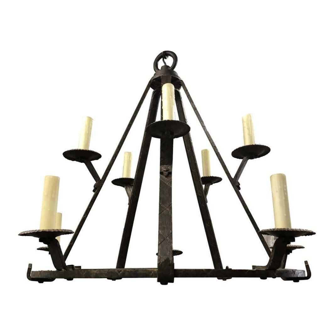 Large Forged Steel Chandelier by Paul Ferrante: Stunning forged steel chandelier designed and manufactured by Paul Ferrante of Los Angeles. This is either a custom piece or a discontinued model not longer offered by Paul Ferrante. Measurements: 43 