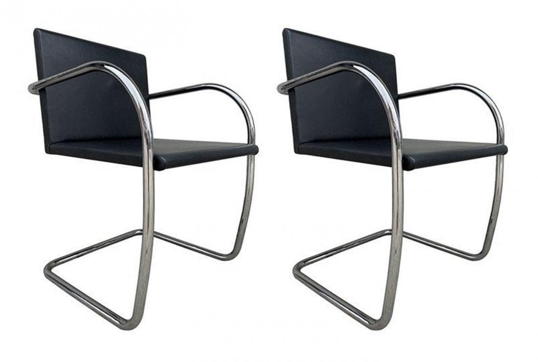 2 Brno Chairs Ludwig Mies van der Rohe for Knoll Int.: Pair of Brno chairs designed by Ludwig Mies van der Rohe for Knoll International. The chairs have tubular frames and they are upholstered in black colored leather which is in very good original condit