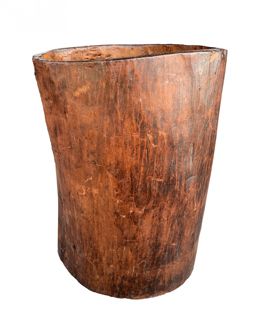 Large Antique Wooden Vase 24.50 Inches High: This unique wood container is made from a hollowed out tree trunk, making it a truly one of a kind piece. The organic appeal comes from the wood itself and a simple base was attached to create a conta