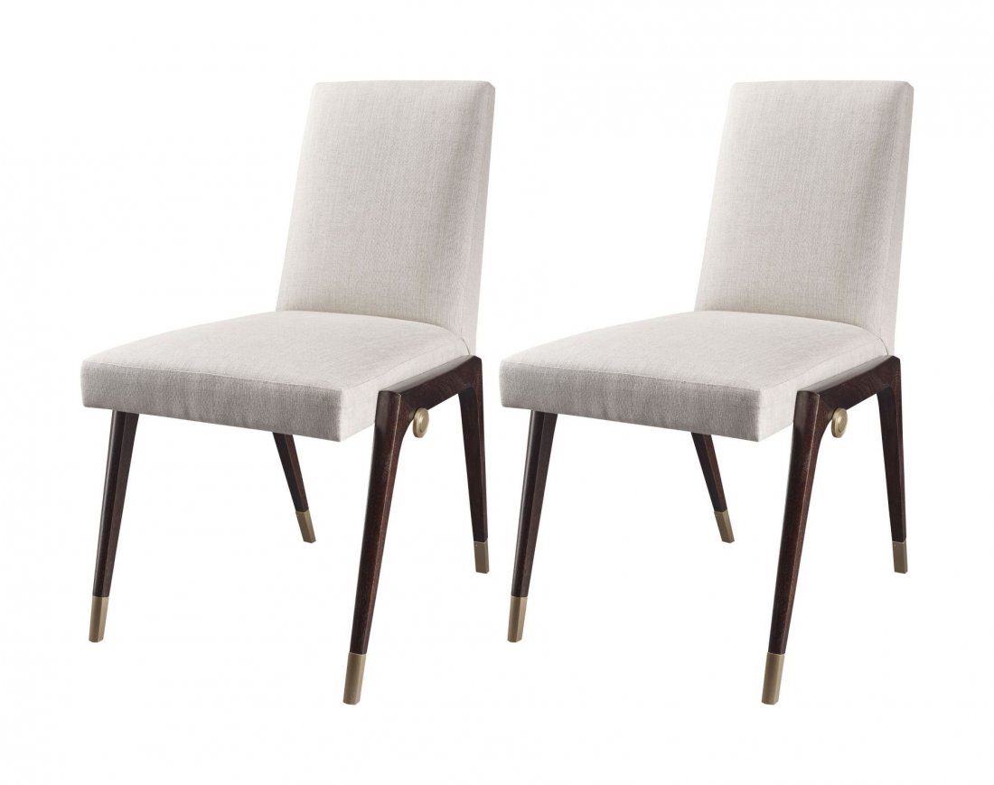 PAIR OF SLING SIDE CHAIRS BY THOMAS PHEASANT for BAKER: Like a sling, the mahogany base supports the finely tailored, crisp upholstery held together with artful brass dowels. The epitome of comfort and design, this chair will make heads turn.The chairs are