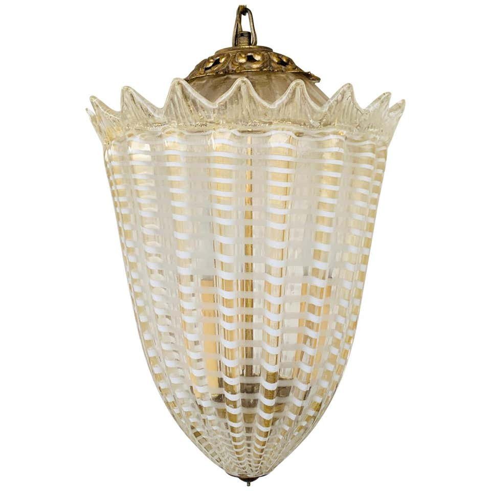 Vintage Murano Glass & Brass Pendant Light: Stunning Murano glass and Brass pendant in the style of Archimede Seguso. The piece has beautiful conical shape whit gold and white swirls going up. The piece is in good vintage condition, the brass s