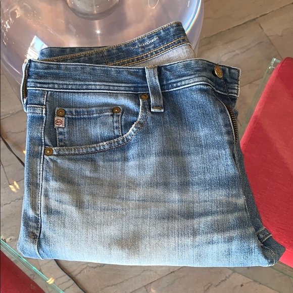 AG Adriano Goldschmied The Matchbox Denim 360 sz33: Nice pair of AG Adriano Goldschmied Distressed Jeans part of “the Matchbox” Denim 360° Collection, made in the USA, size 33” waist x 26.5” inseam x 8” leg opening. The jeans are purposely d