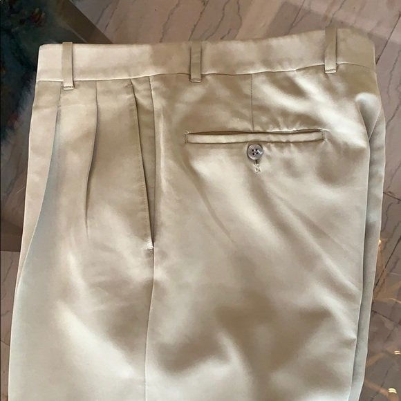 Golf/dress pants by Burberry 34x31.5: Beautiful dress/golf pants designed and manufactured by Burberry in size 34 (17” across waist) x 31.5” inseam x 12.5” rise x 43” length x 9 1/4” leg opening.The pants show very well and are
