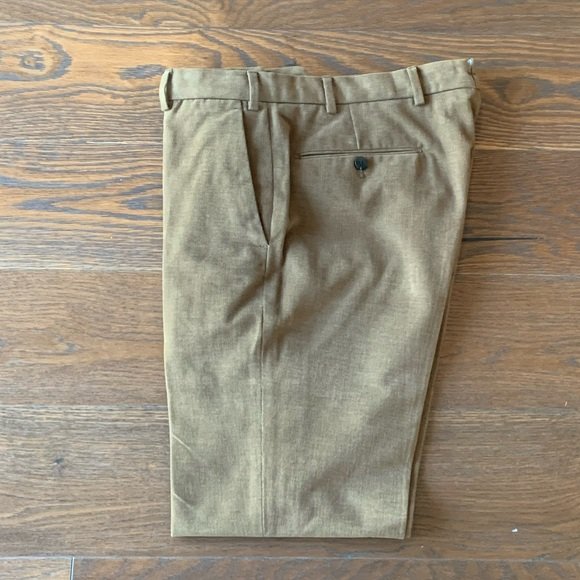 Dress Pants in Brown Cotton by Armani Sz 34x32: Men’s dress pants in brown cotton designed and manufactured by Armani Collezioni, size 34 (17” across waist) x 32” inseam x 10” rise x 42” length x leg opening. Last photo is the more accura