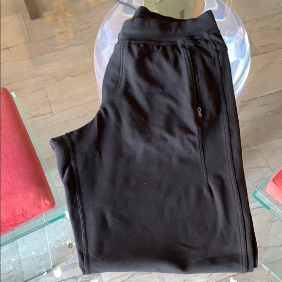 Lululemon sweatpants in size Large x 31: Large Lululemon sweat pants, 31” inseam x 8” leg opening, 4 pockets reflector stripes just below the knee, excellent condition no stains rips or holes and minimal pilling. From a pet and smoke fre