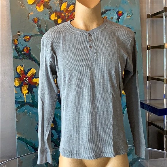 Long Sleeve T Shirt in size L: Long sleeve T shirt in size large, new without tags. 20” shoulder to shoulder x 23” across the chest x 27” length x 25” sleeve length. All items are sold as is. The auction house does not warr