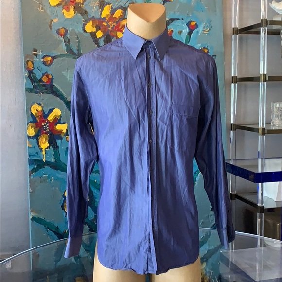 Men’s dress shirt in sz 16.5 by Armani Collezioni: Nice dress shirt designed and manufactured by Armani Collezioni, size 16 1/2 or 42z The shirt is in lavender or purple color with some blue undertones, used and with a small rip on the top left should