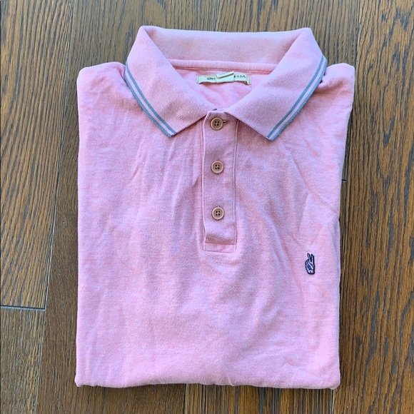 John Varvatos USA Polo Shirt size XL100% Cotton: Nice polo shirt by John Varvatos USA, size XL and made out of 100% cotton. The color is sort of a pink salmon color, the top of the shoulders seems to have a bit of a color variation. Excellent condit
