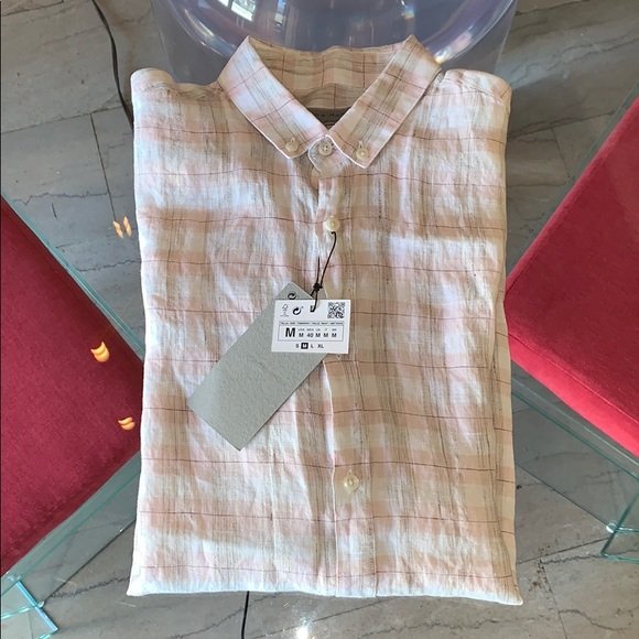 Short Sleeve Button Down Shirt by Zara Man NWT: Beautiful short sleeve button down shirt by Zara Man, made out of 100% Linen, size medium, new with tags. 17” shoulder to shoulder x 20” pit to pit x 29.5” length x 9” sleeve length x 7” sle