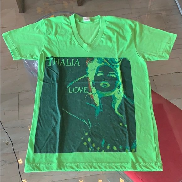 Men’s V Neck T Shirt With Singer Thalia Graphics: Fluorescent green men’s V neck T shirt depicting Mexican singer Thalia “Love” graphics, size Small, Made in the USA by American Apparel, excellent condition with very little wear. 15.5” should