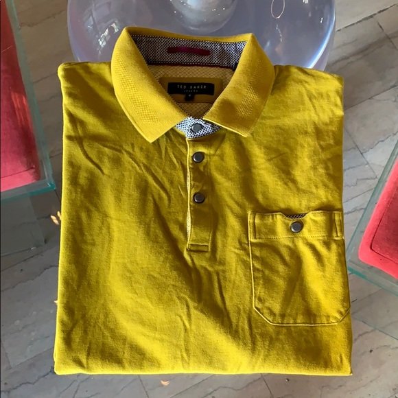 Ted Baker Polo Shirt With Short Sleeve Size 6 or L: Beautiful polo shirt with short sleeve designed and manufactured by Ted Baker London, size 6 European or Large US. The shirt is in mustard yellow color, in excellent condition with minimal wear, no ri