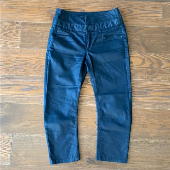 Prony Wauva' Crop Stretch Jeans THEYSKENS' THEORY: An eye-catching extended waist adds a modern touch to form-fitting stretch jeans in a cropped length. Zip fly with button and hook-and-bar closures. Five-pocket style. Approx. inseam: 21". Approx. ris