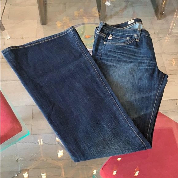 AG Adriano Goldschmied THE MERLOT made in the USA: Beautiful pair of jeans designed and manufactured in Los Angeles California by AG Adriano Goldschmied and part of the Â“BelleÂ” Flare Collection. The jeans are new without tags, size 29 waist x 