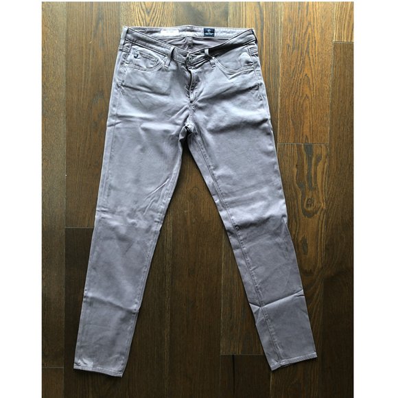 AG Adriano Goldschmied "The Stilt" Cigarette Leg: Designed and manufactured in Los Angeles California, USA.AG Adriano Goldschmied "The Stilt" cigarette leg women';s jeans, size 30x31 with 8" drop from waist to crotch and 6" leg opening. Excellent con
